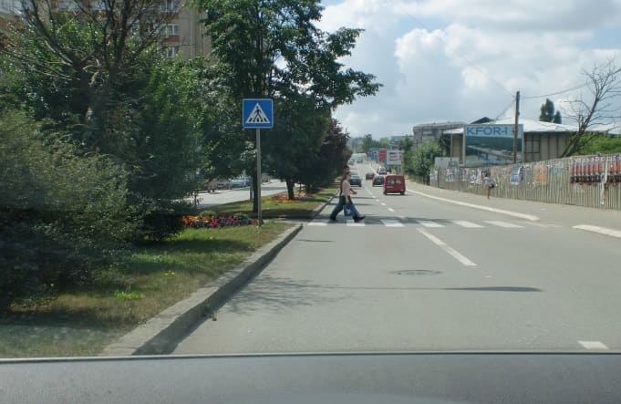 Should you give priority to pedestrians in this situation?