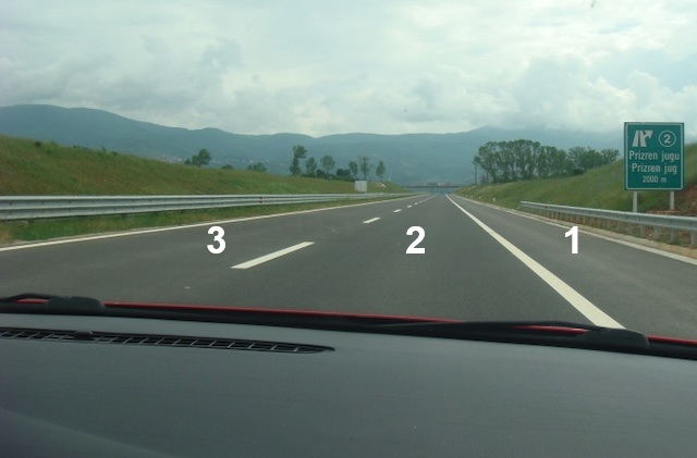 When driving on the highway as in this situation, which lane of traffic you should drive through.