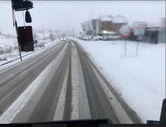 What are the possible dangers while driving  on a snowy road?