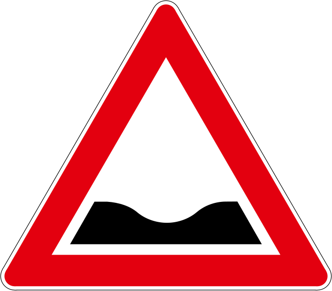 The traffic sign warns of uneven roads.