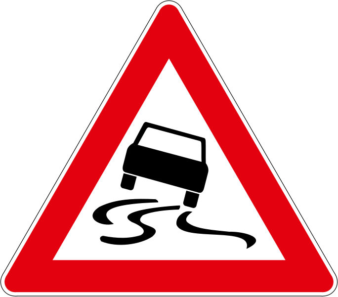 The traffic sign warns of the slippery road.