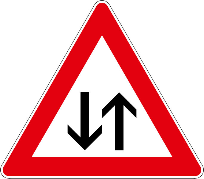 The traffic sign warns of the part of the road where the traffic develops in one direction.