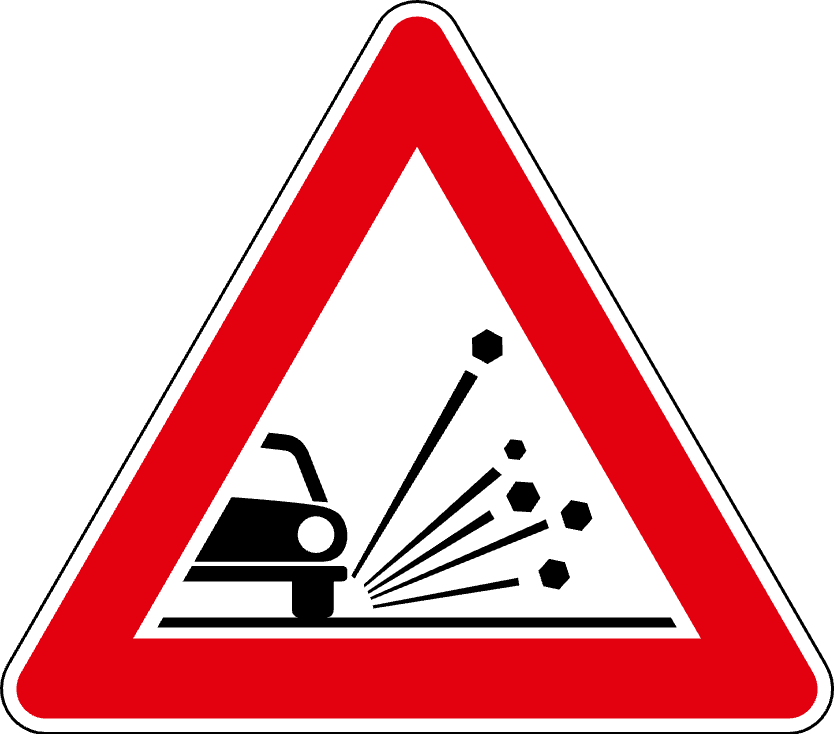 The traffic sign warns of stone collisions.