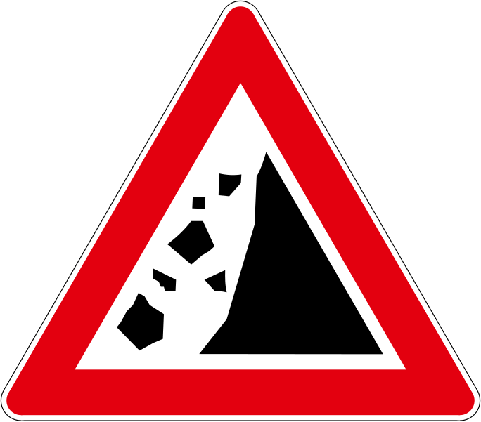 The traffic sign warns of the part of the road where stones can fall (collapse) on the road.