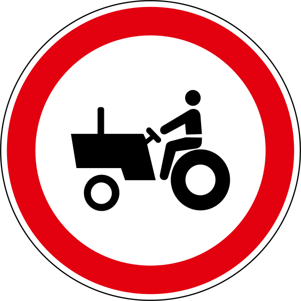 The traffic sign indicates a section of the road where tractors should move.
