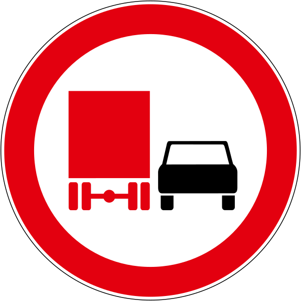 The traffic sign indicates the prohibition of overtaking for transport vehicles-trucks.