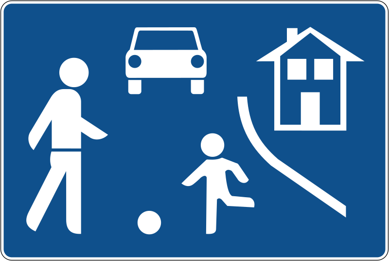 The traffic sign indicates the toy park for children where they play with ball.