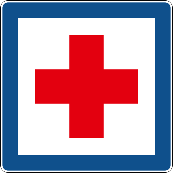The traffic sign shows the International red cross.