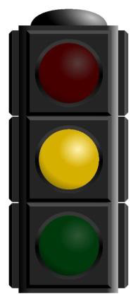 What does the continuous yellow light at the traffic light mean?