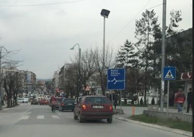 The vehicle is allowed to stop in this situation, if there is not enough space behind the marked pedestrian crossing.