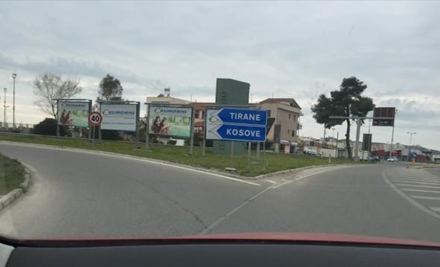 Sign indicates obligatory direction for Kosovo.