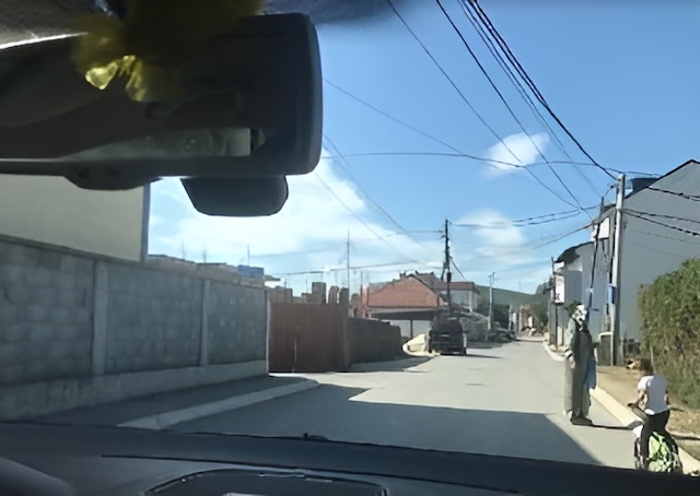 In this situation, I will stop the car and observe the child’s operations with the bicycle.