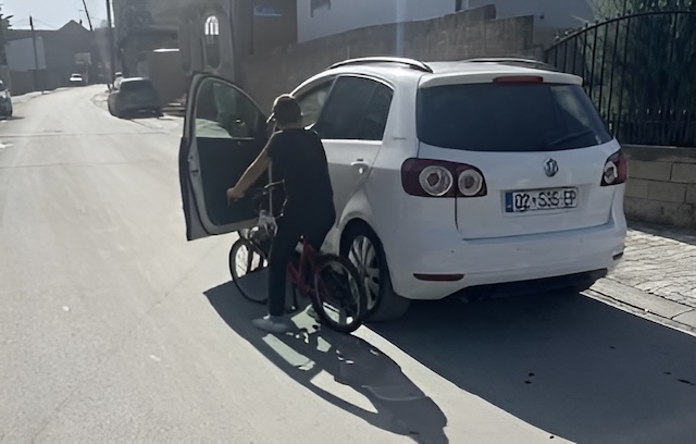 This traffic situation has occurred due to the driver’s lack of attention during the opening of the car door (not looking in the mirror and blind spot).