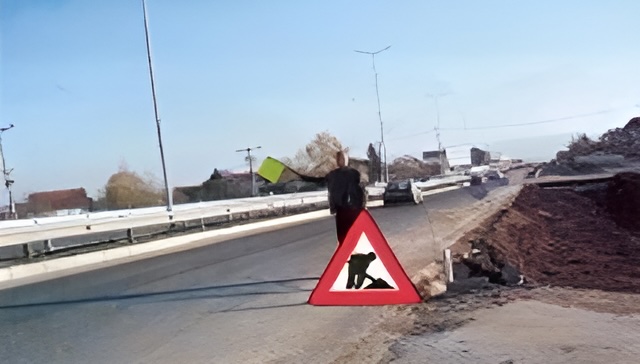 In this situation, you must stop the car, then continue moving at the same speed, because road works.