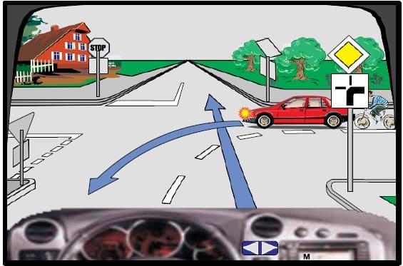 In this intersection, I must make a left turn due to the supplementary sign.