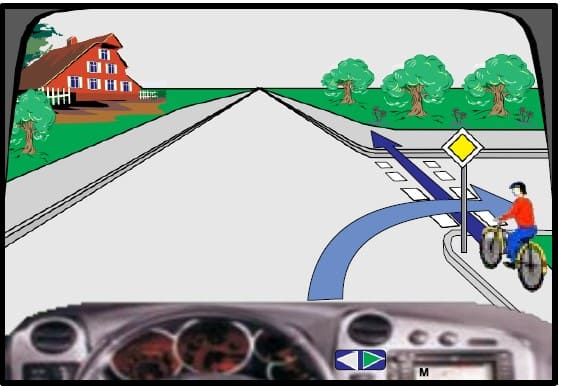 In this intersection I will continue moving in front of the cyclist.