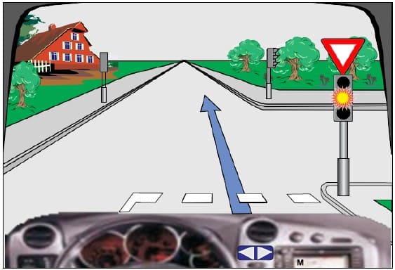 In a traffic light, when the intermittent yellow light is  on. In this situation, I will continue driving with increased caution.